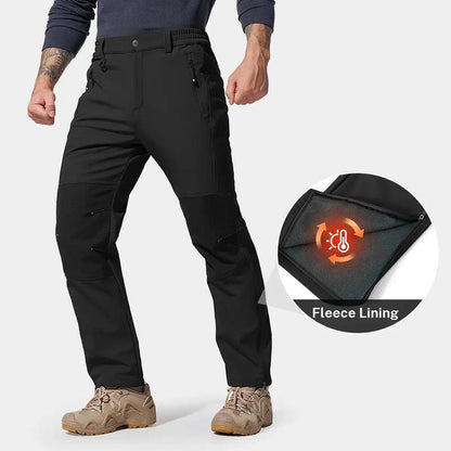 Men's waterproof and warm trousers; waterproof fabric with a pure cotton lining.